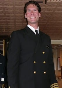 Captain Kevin Martin welcomes passengers aboard the S.S. Legacy.