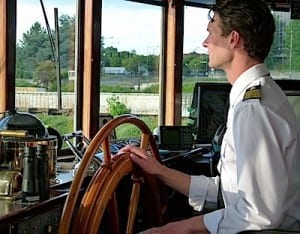 Captain Kevin Martin steers the S.S. Legacy from Portland, Oregon.