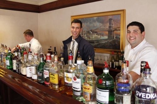 Lined up and ready for Happy Hour is Queen of the Mississippi's capable bar tending team, (L to R) Kevin Snyders, Robert Alexander and Tony Eberhardt.